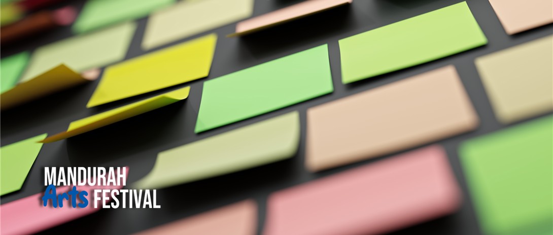Colourful sticky notes stuck to a black wall